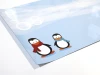 Magnetic dry-erase board for kids featuring penguins on a blue background with two penguin designs.