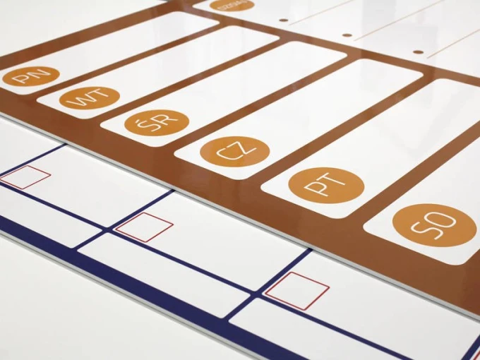 Dry-erase planner board 244 - Graphic design with rectangular sections for days of the week and space for notes.