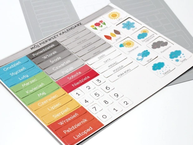Children\'s calendar with magnets - Graphic design featuring pictograms for days, months, and weather.