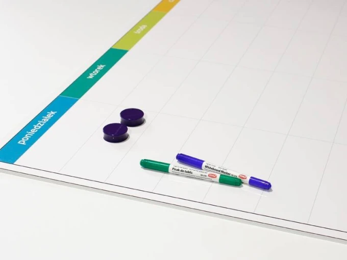 Magnetic dry-erase weekly planner board - Simple grid with days of the week and colorful design.