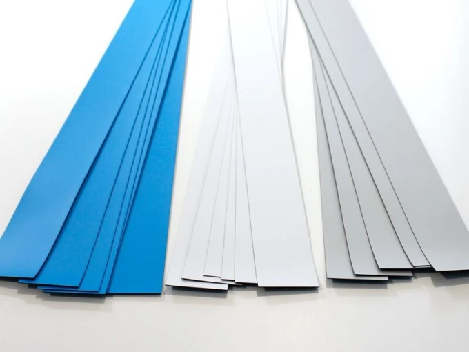 Self-adhesive magnetic strip for magnets, 60 cm - various colors - Graphic design with simple rectangular shapes.