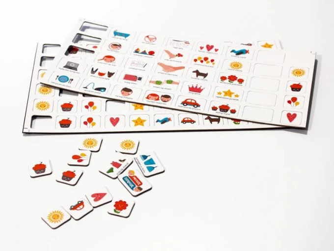 Magnetic task board - Graphic design featuring various tasks and symbols.