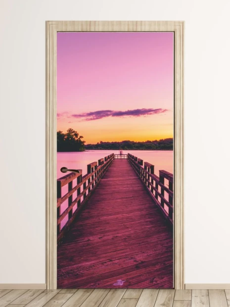 Sunset pier door mural FP 3178 - Graphic design. The pier leads to water, surrounded by trees.