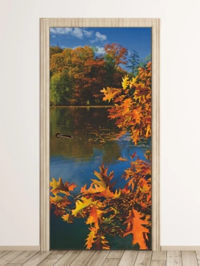 Autumn leaves wallpaper for doors, featuring yellow and orange hues against a lake background.