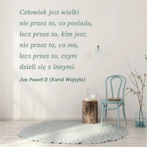 Painting template quote: Man is great 1962 - Living room arrangement. Light walls, wooden furniture, minimalist style.