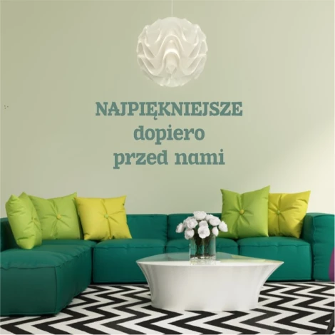 Painting template with the phrase "the best is yet to come" 1936 - Living room arrangement. Light-colored walls, furniture.