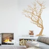 Painting template tree 1132 - Living room arrangement. Light-colored walls, modern furniture, and a fireplace.