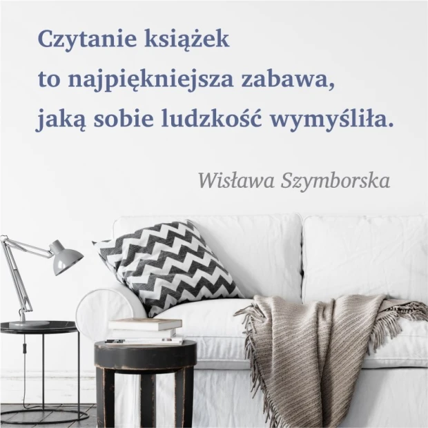 Wall quote template: Reading books is the most beautiful fun 1969 - Living room decor. Gray walls, light sofa.