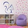 Squirrel painting template 2005 - Decor for a child\'s room. Light-colored walls with circular patterns.