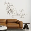 Floral branch painting template 2110 - Living room setup with light walls, brown sofa, and modern table.