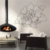 Floral painting template 2083 - Living room setup with light walls and large floral graphic by the fireplace.