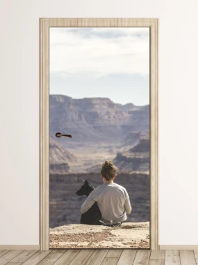 Canyon door wallpaper FP 6206 - Living room setup with light-colored walls and wooden flooring.