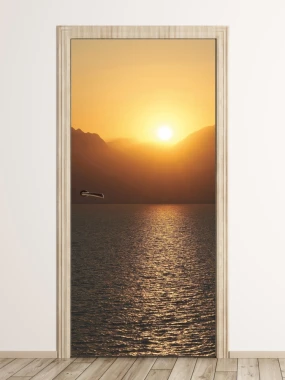 Ocean door mural FP 6199 - Graphic design featuring a sunset over water with mountains in the background.