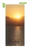 Ocean door mural FP 6199 - Graphic design featuring a sunset over water with a mountainous backdrop.
