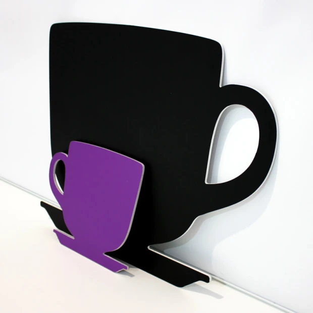 Chalkboard magnetic board in the shape of a large black cup with a smaller cup design.