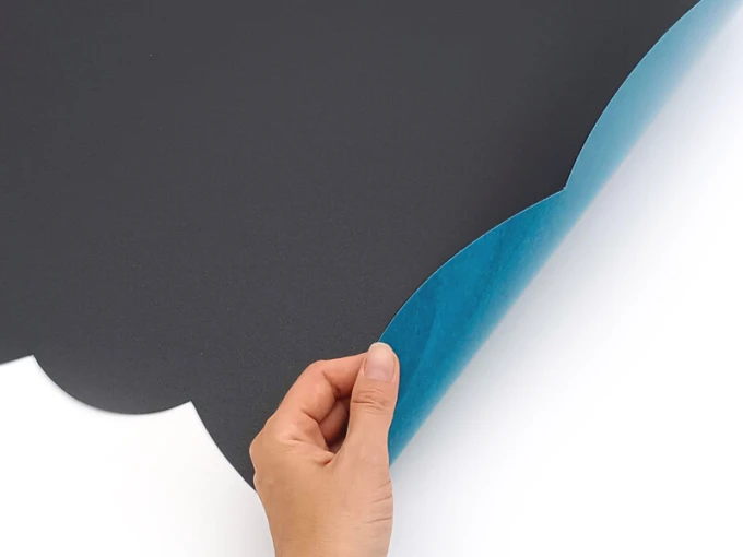 Chalkboard magnetic board for kids in cloud shape with rounded edges, dark color, graphic design.