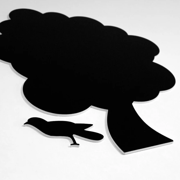 Magnetic chalkboard for kids in tree shape with a large crown and a bird design.