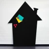 Magnetic chalkboard for kids, house shape with chimney, black background, colorful design.