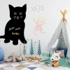Magnetic chalkboard for kids featuring a cat design, perfect for bright children\'s room decor with a cozy carpet.