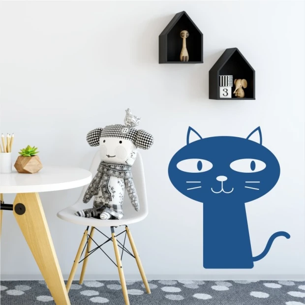 Curious cat wall sticker 2367 - Styled in a room with light walls, modern furniture, and toys.