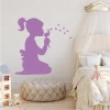 Wall sticker for girls featuring a dandelion, perfect for a child\'s room with light-colored walls.
