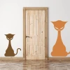 Cat wall sticker 2343 - Entryway decor with light-colored walls, wooden doors, and flooring.