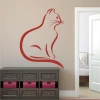 Cat wall sticker 2344 - Bedroom decor with light-colored walls and gray furniture.