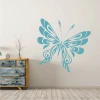 Butterfly wall sticker 2348 - Living room decor with light-colored walls and rustic-style furniture.