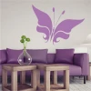 Butterfly wall sticker 2354 - Living room decor with light-colored walls and purple furniture.