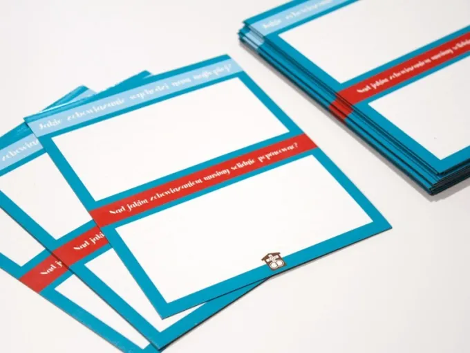 Custom dry-erase magnetic board with graphic design. Simple blue rectangles with white accents.