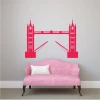 Wall sticker London Bridge 2287 - Living room decor. Light-colored walls, pink sofa with a white cushion.