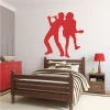 Musician wall sticker 2264 - Bedroom decor with light-colored walls and brown furniture.