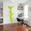Wall sticker of a bird on a tree 2371 - Office decor with light-colored walls, wooden floor, and shelf.