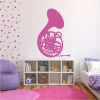 Wall sticker horn 2262 - Decor for a child\'s room. Light-colored walls with colorful dots.