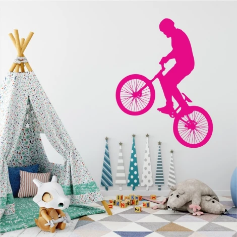 BMX wall sticker for kids\' room decor. Bright walls with a tent in the background.