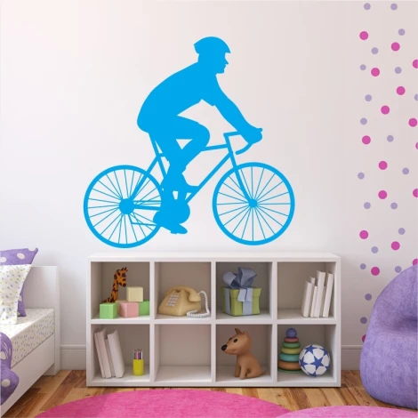 Wall sticker cyclist 2332 - Decor for a child\'s room. Light-colored walls, pastel furniture.