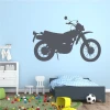 Motorcycle wall sticker 2309 - Decor for a child\'s room. Light-colored wall with white and blue furniture.