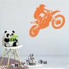 Wall sticker motorcyclist 2319 - Decor for a child\'s room. Light-colored walls, modern furniture.