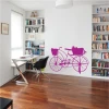 Wall sticker bicycle 2323 - Office decor. Light-colored walls, wooden floor, bookshelf with books.