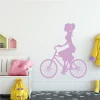 Biker wall sticker 2326 - Room decor with light-colored walls and minimalist furniture.