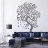 Sticker 03X 08 tree 1934 - Living room arrangement with light-colored walls and gray furniture.