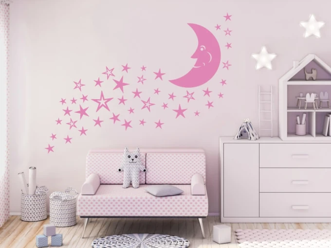 Charming moon and star painting template in a pastel children\'s bedroom, adding magic and charm.