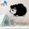Chalkboard sticker for kids - hedgehog design. Bright walls and pastel furniture in a children\'s room setting.