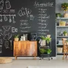 Custom chalkboard - Kitchen decor. Dark walls, wooden furniture, and plants.