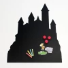 Magnetic chalkboard for kids featuring a castle design with towers, colorful crayons, and magnets.