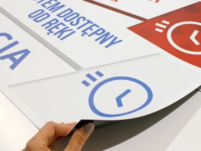 Custom printed magnet - Graphic design featuring blue clocks and text in various colors.