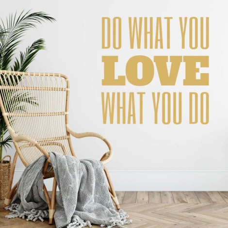 Wall sticker with the phrase "Do what you love" - styled in a bright living room with wooden flooring.