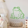 Frog wall template for kids 2390 - Bright room decor with soft furniture and toys.