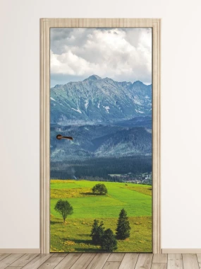 Mountain door sticker FP 6327 - Room decor with light-colored walls and wooden flooring.