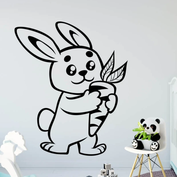Children\'s painting template featuring a bunny holding a carrot, with large ears and round cheeks.